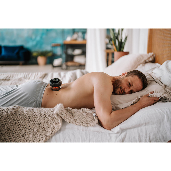 Anti-cellulitmassage med värme och rött ljus i svart