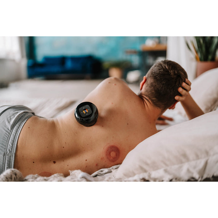 Anti-cellulitmassage med värme och rött ljus i svart