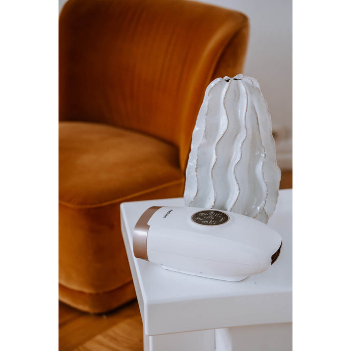 Handmassage med värme och vibration i vitt