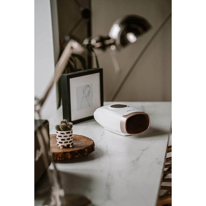 Handmassage med värme och vibration i vitt