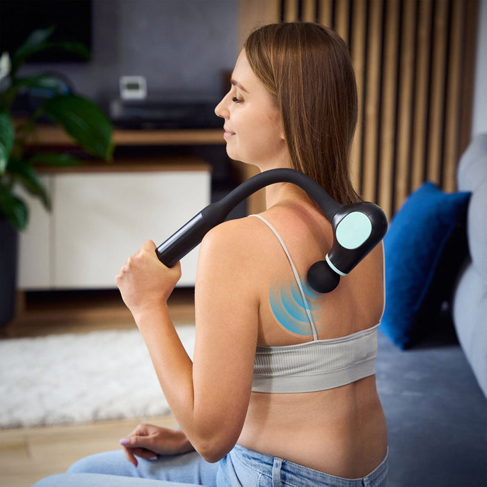 Handhållen massage med fem intensiteter i svart