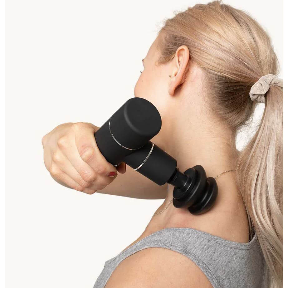 Kompakt massagepistol med fem massagehuvuden