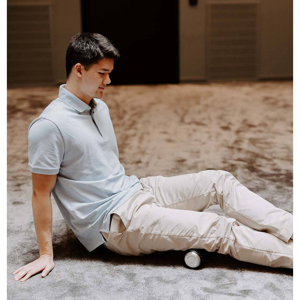 Vattenflaska och foamroller i ett